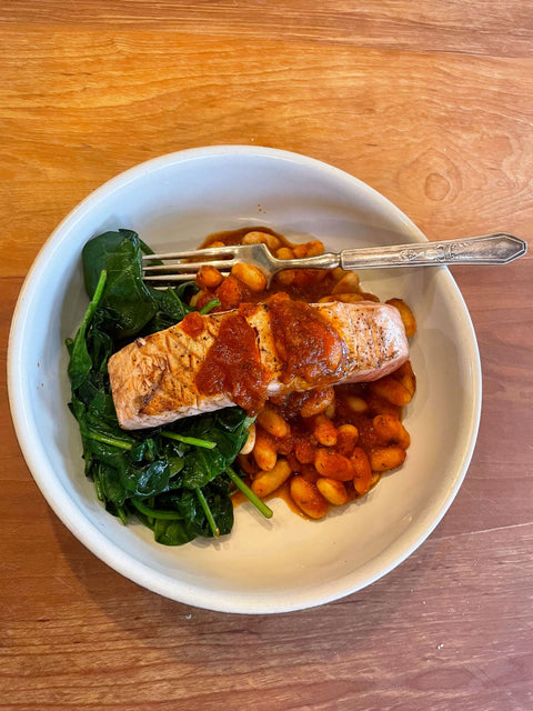 Tomato Basil Salmon with Sauteed Spinach and White Beans