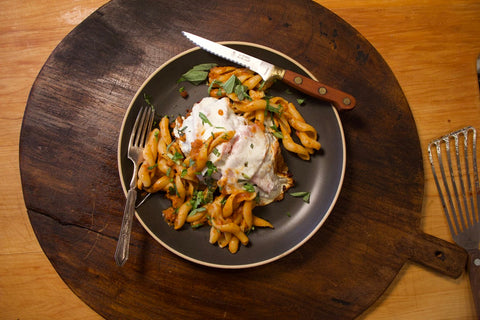 Creamy Sundried Tomato Pesto Chicken Parmesan