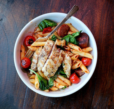 Savory Provencal Pasta with Chicken, Blistered Tomatoes and Sausage with Spinach