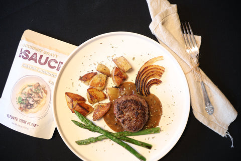 Bison Steak with Savory Mushroom Gravy and Roasted Potatoes