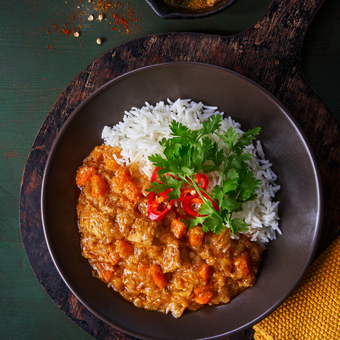 Chicken and Rice with Marry Me Chicken Gravy
