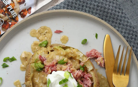 Loaded Baked Potatoes with Green Peppercorn Sauce